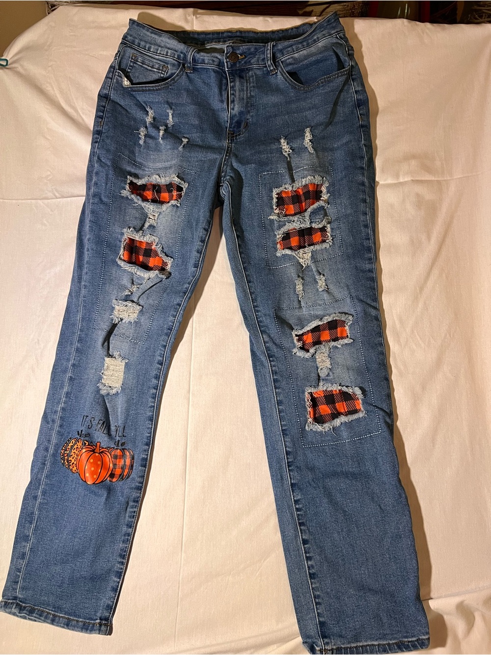 Women's Distressed Blue Jeans with Orange Plaid Patch Accents
